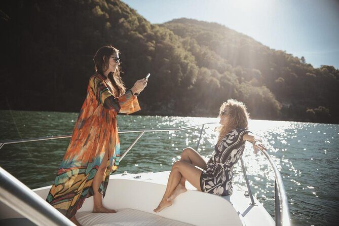 3 Hours Private Boat Cruise on Lake Como with Open Bar - Getting on board at Tremezzzo: boat comfort, open bar, and Captain Giovanni