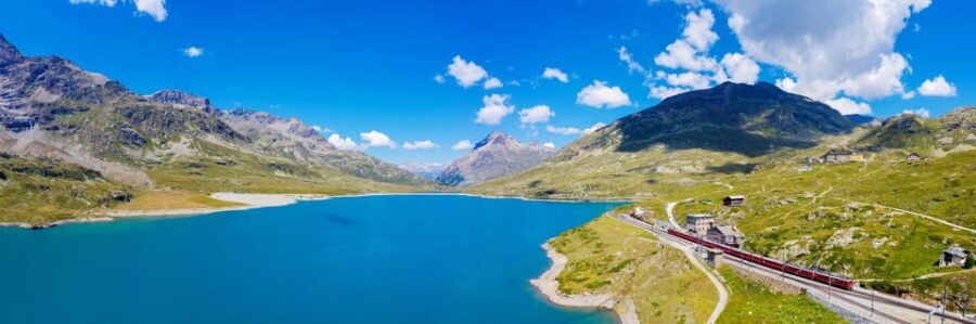 From Milan: Bernina Train Guided Tour to St. Moritz - Meeting at Milan’s Central Station: the Apple Monument start