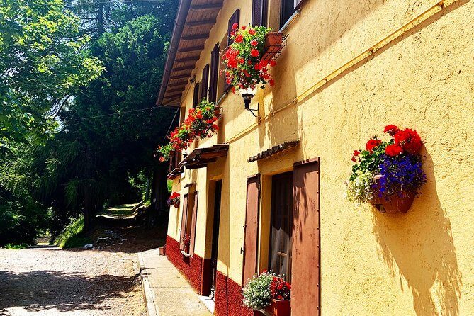 MTB Tour Lake Como Mountain Views & Local Cuisine - Faro voltiano: a quick lighthouse stop with serious altitude views