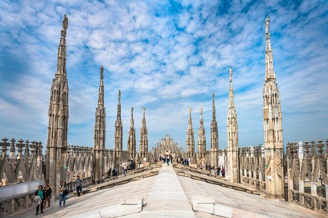 Sky-High Delights: Duomo Tour with Rooftop Adventure! - Clothing, security, and what slows people down